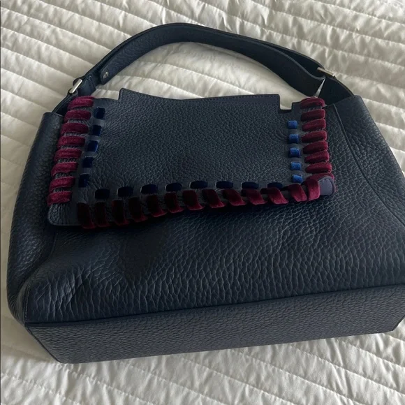 Orciani navy blue with burgundy and blue velvet accents. - Picture 2 of 5